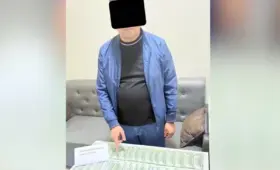 Замглавы управления банка в Андижане задержан при получении $40 тысяч