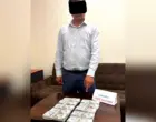 В Ташкентской области сотрудника банка задержали при получении $100 тысяч