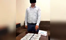 В Ташкентской области сотрудника банка задержали при получении $100 тысяч